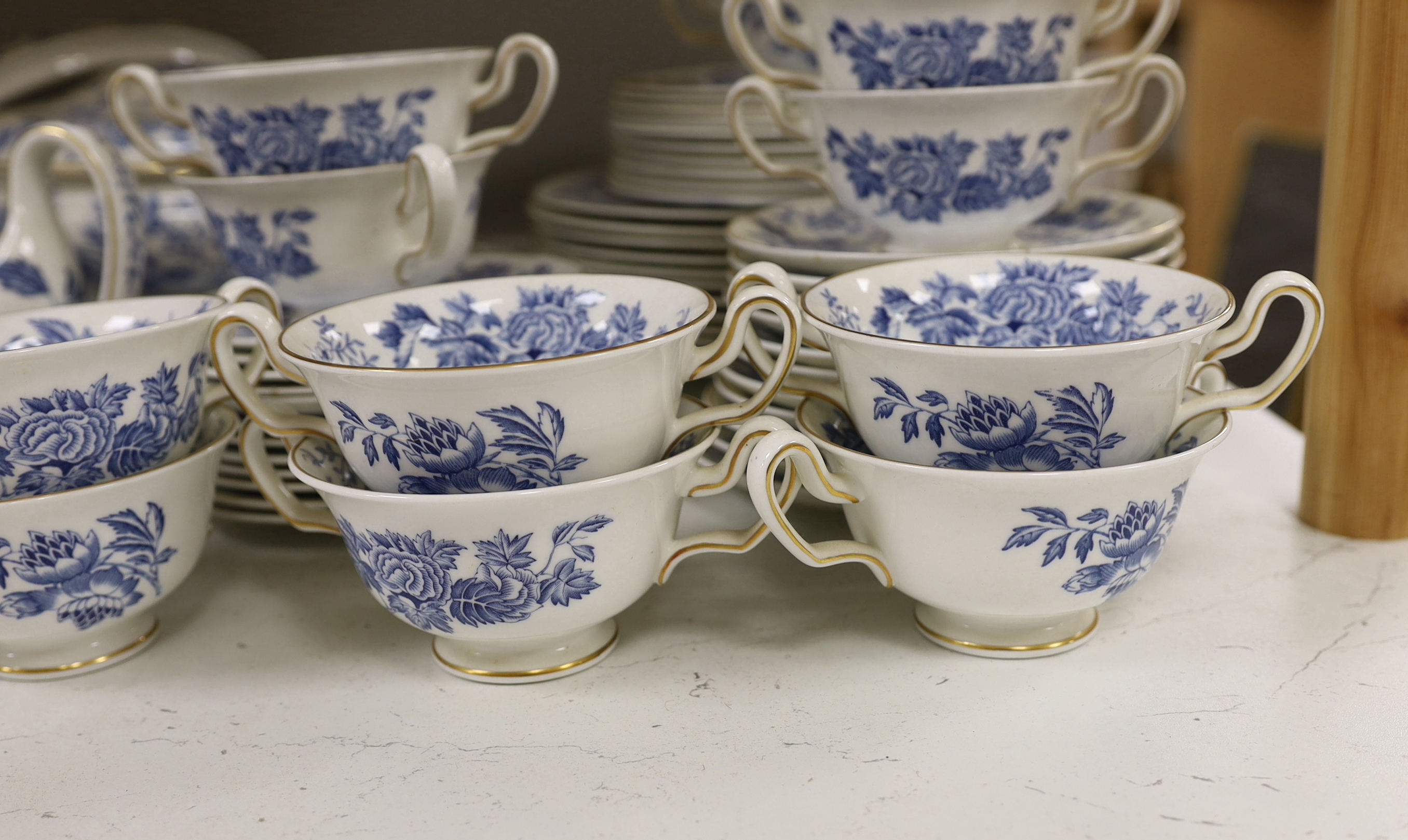 A Wedgwood bone china blue and white dinner service including oval platters, sauce boats and a tureen